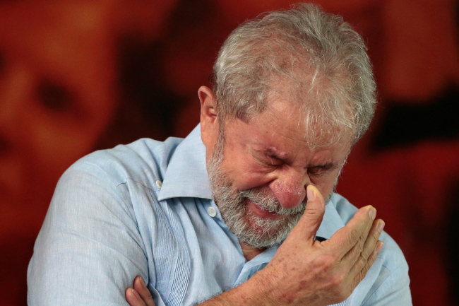 Former Brazilian president Luiz Inacio Lula da Silva attends a meeting with members of the Workers Party (PT) in Sao Paulo